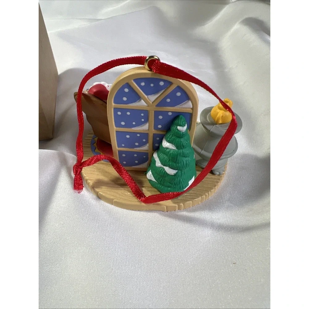 Vintage Avon Christmas with Santa Taking A Nap Ornament New In Box Resin Grandma